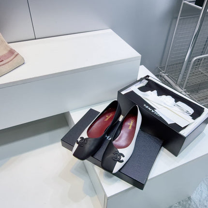 CHANEL 26S SQUARE-TOE FLATS IN BLACK AND WHITE LAMBSKIN