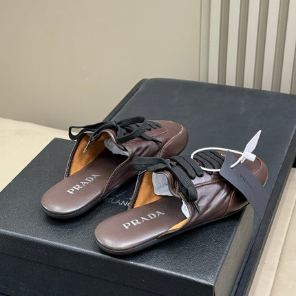 PRADA 25S COLLAPSE MULES IN DARK BROWN CALFSKIN