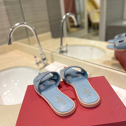 VALENTINO 26S SLIDES IN PASTEL BLUE CALFSKIN WITH LOGO