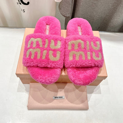 MIUMIU 26S SANDALS IN PINK SHEARLING WITH LOGO LETTERING