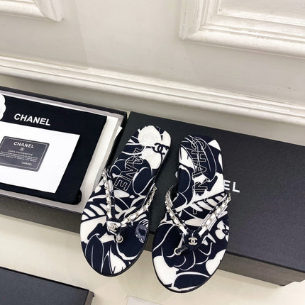 CHANEL 26S THONG SANDALS IN BLACK AND WHITE FLORAL PRINT FABRIC