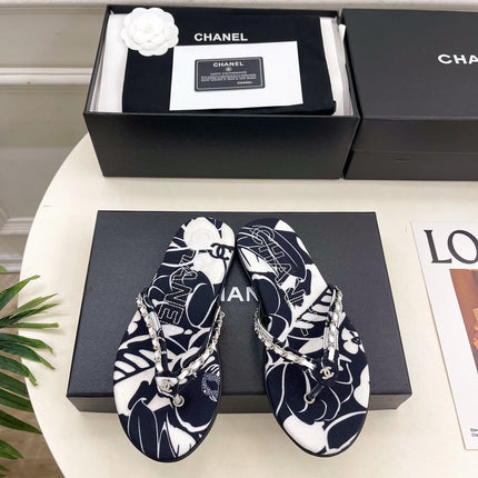 CHANEL 26S THONG SANDALS IN BLACK AND WHITE FLORAL PRINT FABRIC