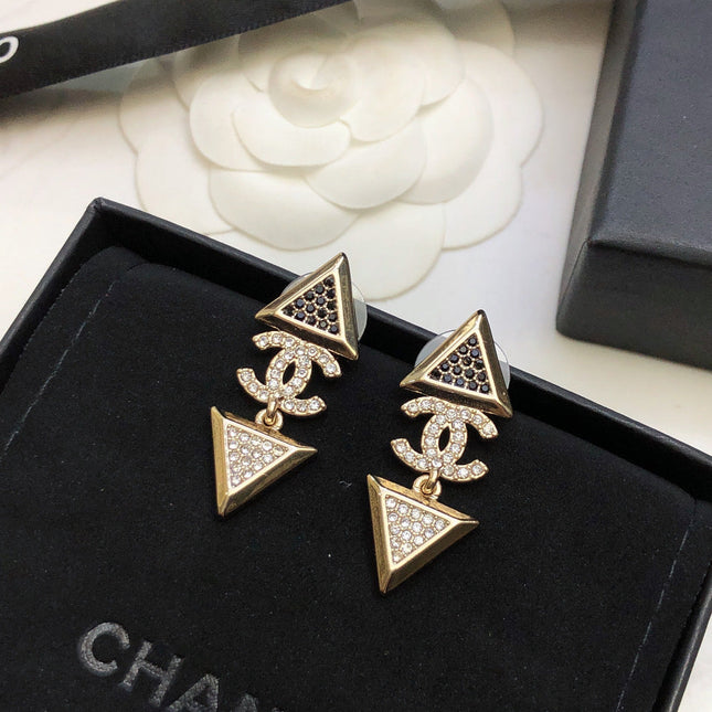 CHANEL 26S DOUBLE C LOGO TWO-TONE CRYSTAL TRIANGLE DROP EARRINGS IN GOLD METAL 631834